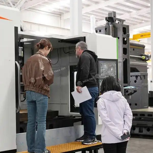 brazilian customer inspecting cnc lathe
